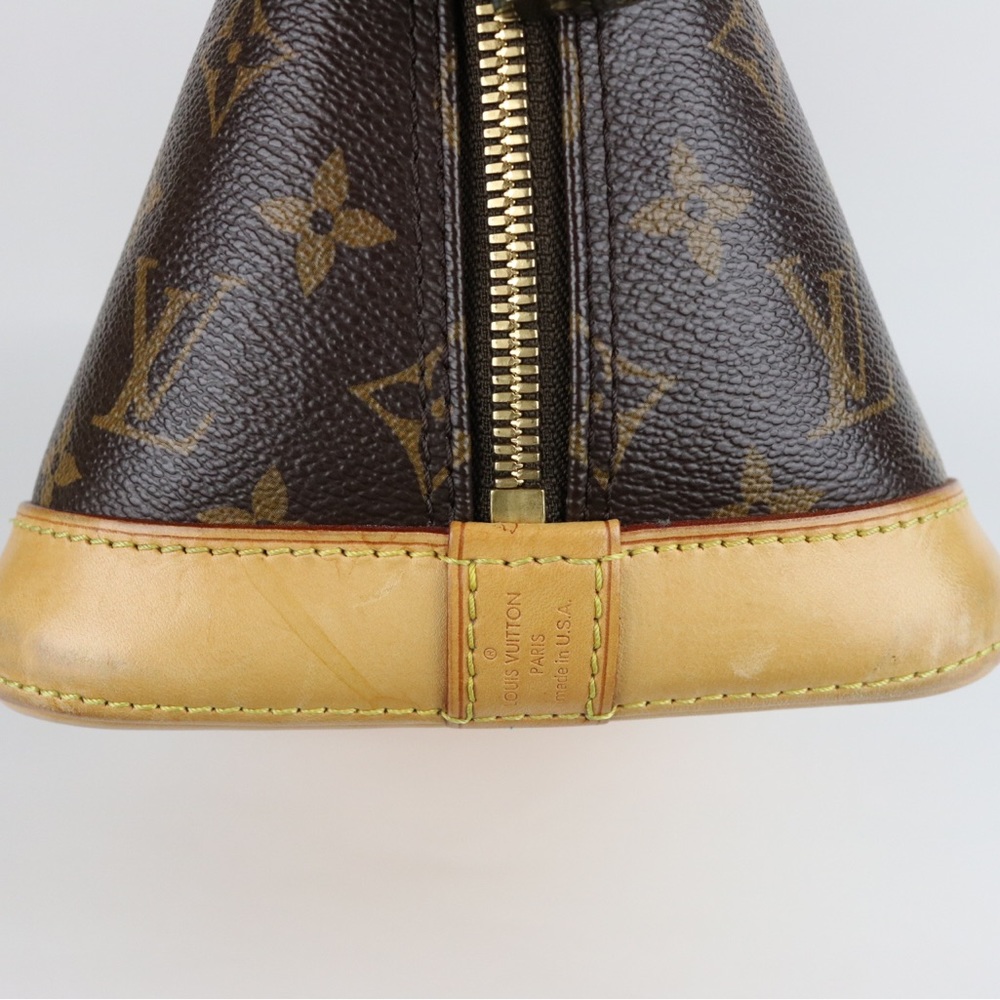 Louis Vuitton Alma MM Monogram Canvas Leather Satchel - Picture 10 of 15